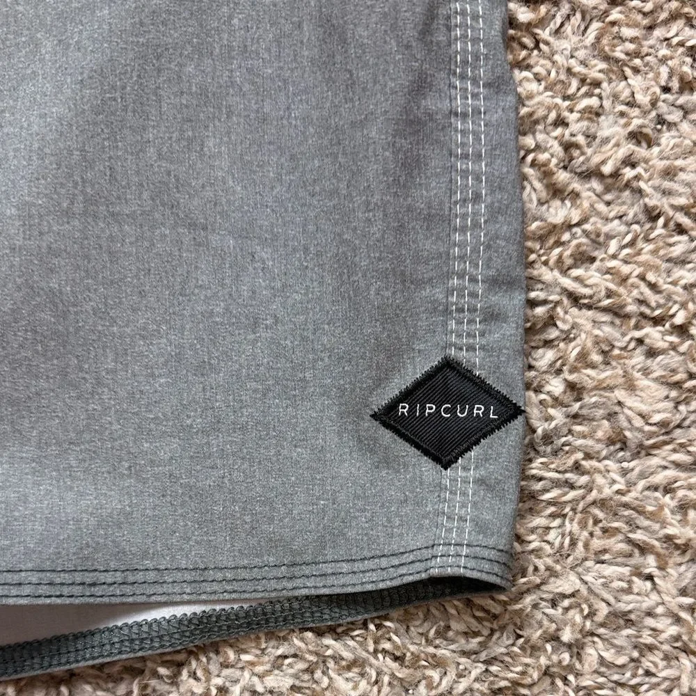 Rip Curl Gray, Blue & Yellow Striped Board Shorts